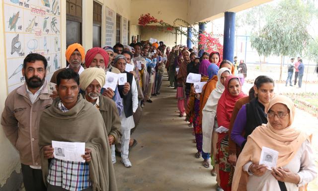 Residents stand in a queue to cast their vote at Lambi in Muksar on Saturday. (Sanjeev Kumar/HT Photo) Residents stand in a queue to cast their vote at Lambi in Muksar on Saturday. (Sanjeev Kumar/HT Photo)