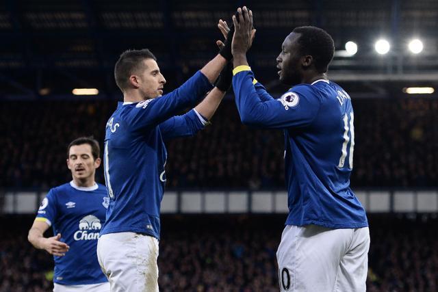 Everton striker Romelu Lukaku (R) celebrates with Kevin Mirallas after scoring their fourth goal. (AFP)