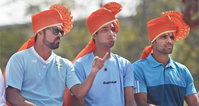 Leander Paes (from left), Ramkumar Ramnathan and Vishnu Vardhan during the inaugural ceremony of the Davis Cup at Balewadi Stadium in Pune on Thursday. (PTI) Leander Paes (from left), Ramkumar Ramnathan and Vishnu Vardhan during the inaugural ceremony of the Davis Cup at Balewadi Stadium in Pune on Thursday. (PTI)