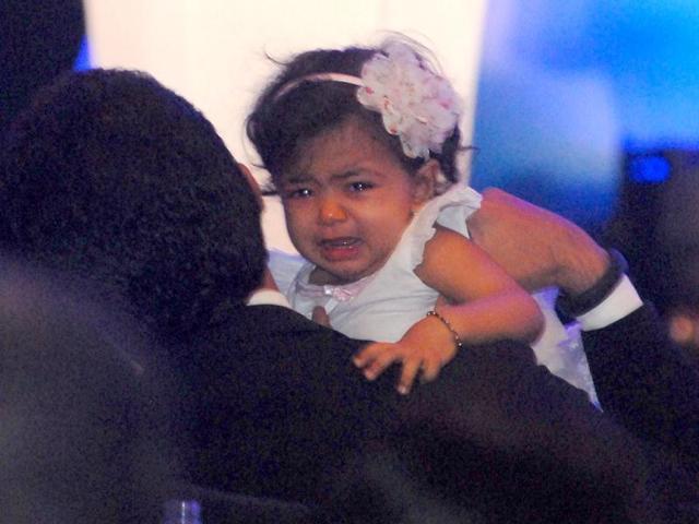 Aaradhya cries as Abhishek tries to pacify her. (HT Photo/Prodip Guha) Aaradhya cries as Abhishek tries to pacify her. (HT Photo/Prodip Guha)
