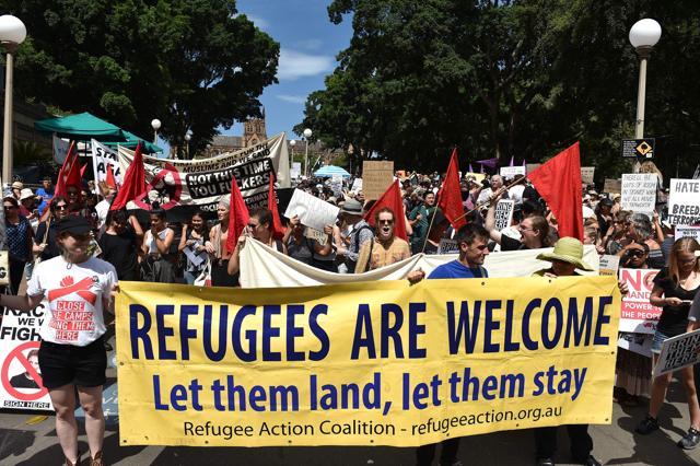 Protestors march on the streets of Sydney's central business district against US President Donald Trump's travel ban policy. (AFP photo) Protestors march on the streets of Sydney's central business district against US President Donald Trump's travel ban policy. (AFP photo)