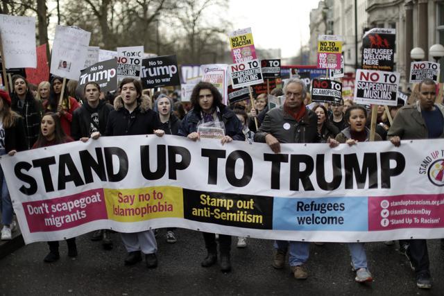 People hold a banner as they take part in a protest march in London, against U.S. President Donald Trump's ban on travellers and immigrants from seven predominantly Muslim countries entering the U.S. (AP Photo) People hold a banner as they take part in a protest march in London, against U.S. President Donald Trump's ban on travellers and immigrants from seven predominantly Muslim countries entering the U.S. (AP Photo)