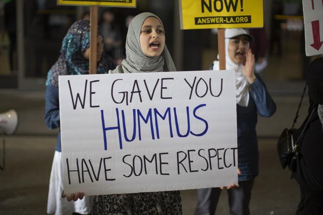 Demonstrators support a ruling by a federal judge in Seattle that grants a nationwide temporary restraining order against the presidential order to ban travel to the United States from seven Muslim-majority countries, at Tom Bradley International Terminal in LA. (AFP Photo) Demonstrators support a ruling by a federal judge in Seattle that grants a nationwide temporary restraining order against the presidential order to ban travel to the United States from seven Muslim-majority countries, at Tom Bradley International Terminal in LA. (AFP Photo)
