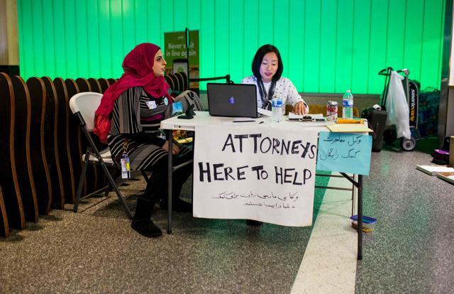Volunteer translator Nour Our (L) and volunteer attorney Kat Choi (R) sit in the arrivals area during a protest against the executive order by US President Donald Trump, at Los Angeles International Airport. (AFP photo) Volunteer translator Nour Our (L) and volunteer attorney Kat Choi (R) sit in the arrivals area during a protest against the executive order by US President Donald Trump, at Los Angeles International Airport. (AFP photo)