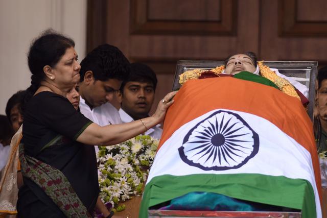 This December 6, 2016, photograph shows VK Sasikala next to the mortal remains of former chief minister of Tamil Nadu state Jayalalithaa during her funeral in Chennai. (AFP file photo) This December 6, 2016, photograph shows VK Sasikala next to the mortal remains of former chief minister of Tamil Nadu state Jayalalithaa during her funeral in Chennai. (AFP file photo)