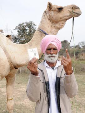 A villager rode on his camel to reach the polling station. (Anil Dayal/HT Photo) A villager rode on his camel to reach the polling station. (Anil Dayal/HT Photo)