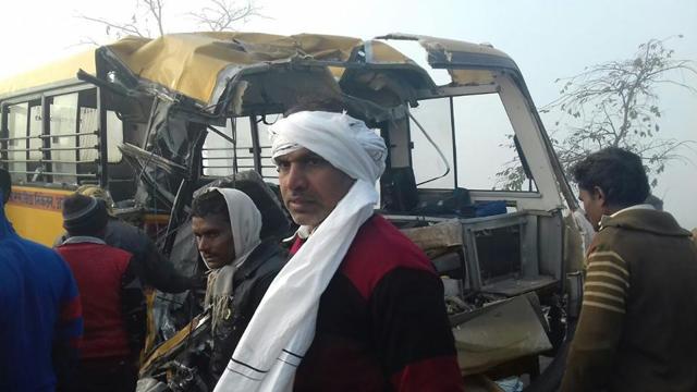 Bystanders gather near the scene of a bus crash in Etah in the state of Uttar Pradesh. (AFP Photo) Bystanders gather near the scene of a bus crash in Etah in the state of Uttar Pradesh. (AFP Photo)