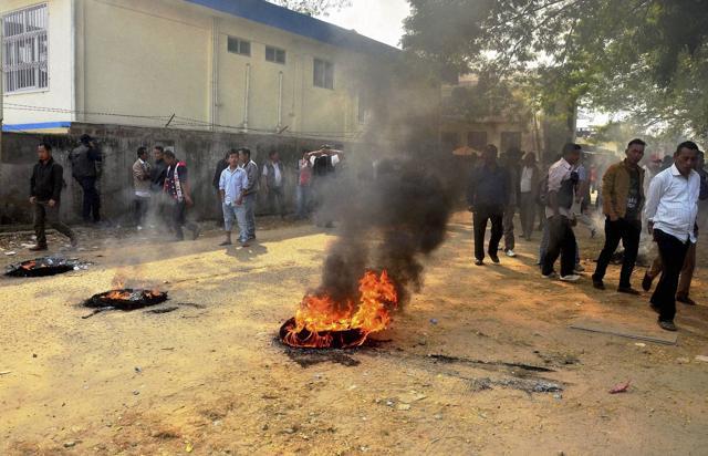 Protesters burn tyres on the road during a bandh called in Dimapur last week. (PTI photo) Protesters burn tyres on the road during a bandh called in Dimapur last week. (PTI photo)