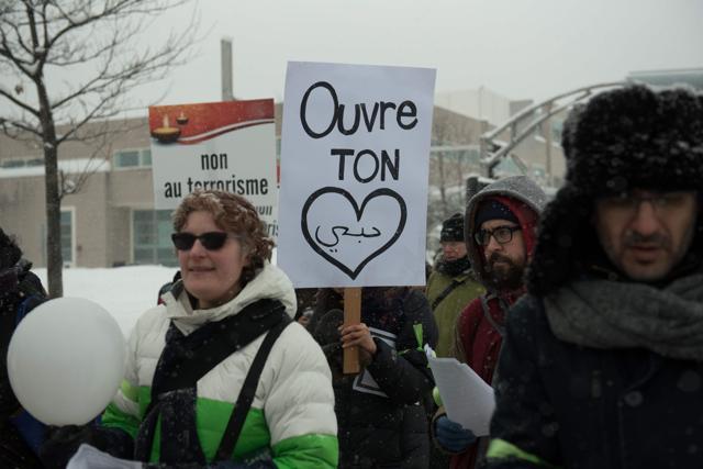 People march in Quebec City. (AFP photo) People march in Quebec City. (AFP photo)