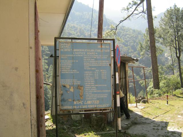 A rusting signboard of the stalled Lohari Nagpala hydro-power project. (Anupam Trivedi/HT Photo)