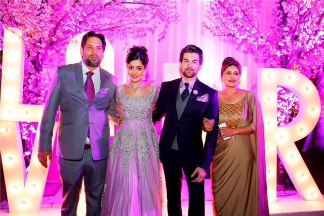 The couple poses with Rukmini’s family. (The Wedding Story) The couple poses with Rukmini’s family. (The Wedding Story)