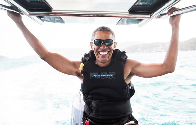 Branson says after spending a couple days learning to kitesurf, Obama bested the billionaire in a watersport challenge. He says inviting the Obamas to his island was “a huge honor.” (REUTERS) Branson says after spending a couple days learning to kitesurf, Obama bested the billionaire in a watersport challenge. He says inviting the Obamas to his island was “a huge honor.” (REUTERS)