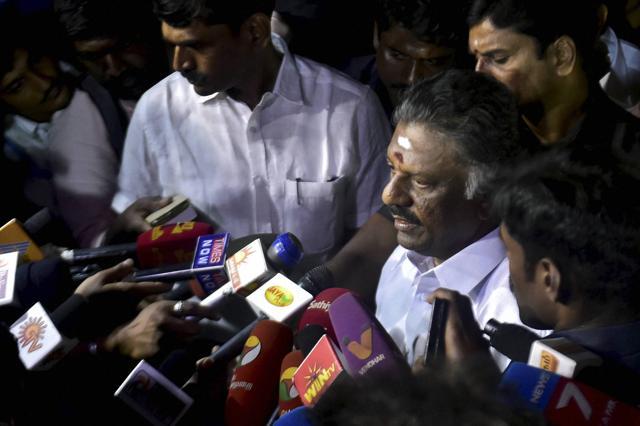 O Panneerselvam addresses media after meditating in front of Jayalalithaa's burial site. (PTI Photo)
