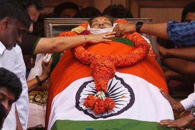 People pay homage to former Tamil Nadu chief minister Jayalalithaa Jayaraman in Chennai. (Reuters Photo) People pay homage to former Tamil Nadu chief minister Jayalalithaa Jayaraman in Chennai. (Reuters Photo)