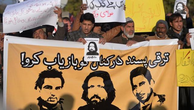 Activists hold images of bloggers who went missing during a protest in Islamabad in January. (AFP) Activists hold images of bloggers who went missing during a protest in Islamabad in January. (AFP)