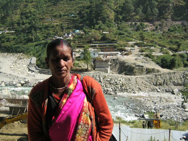 “Our life dangles between hope and despair. We have repeatedly faced natural disasters. Those who can afford, have preferred to migrate,” says Chandrabhaga, a mother of three as she waits for the cable car. (Anupam Trivedi/HT Photo)
