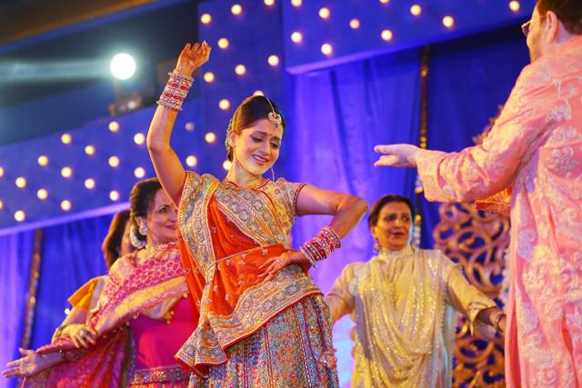 Rukmini dances during her sangeet. (The Wedding Story) Rukmini dances during her sangeet. (The Wedding Story)