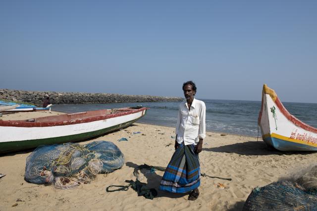 Powler Kumar, 56 years, works for boat owners and has not been going to fish ever since the oil spills happened. No one is willing to give even Re 1 for a fish that usually costs Rs 10, he complains. The Government is not addressing the problem and it neither asking them about their issues. They claimed they will clean it in 7 days, and its been 12 days now, cleaning is not complete yet, and Powler complains of having no work because of it. Powler manages to earn close to 6000 Rs per month out of the 4-5 trips he makes into the sea in small boats of 4 people. (Saumya Khandelwal/HT PHOTO)