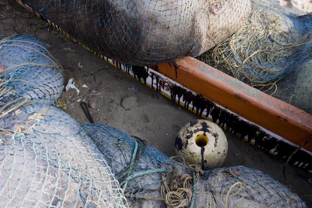Boats and fishing paraphernalia was damaged because of the oil spill at Bharathi Nagar Beach in Chennai. (Saumya Khandelwal/HT PHOTO)