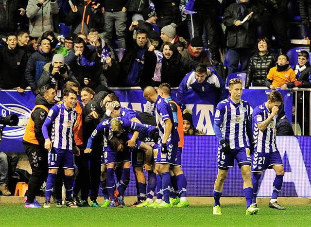 Deportivo Alaves players celebrate after scoring their first goal during the Spanish Copa del Rey (King's Cup) semi final second leg match against Celta Vigo. (AFP/Getty Images) Deportivo Alaves players celebrate after scoring their first goal during the Spanish Copa del Rey (King's Cup) semi final second leg match against Celta Vigo. (AFP/Getty Images)