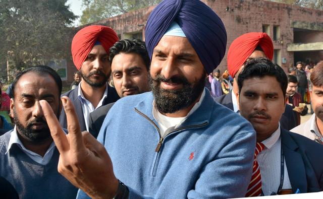SAD candidate Bikram Singh Majithia after casting his vote in one of the polling stations in Majitha constituency in Amritsar on Thursday. (Gurpreet Singh/HT)