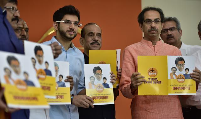 hiv Sena chief Uddhav Thackeray, son Aaditya and other party leaders launch the party’s manifesto for the BMC polls on January 23, 2017. (Arijit Sen/HT PHOTO)