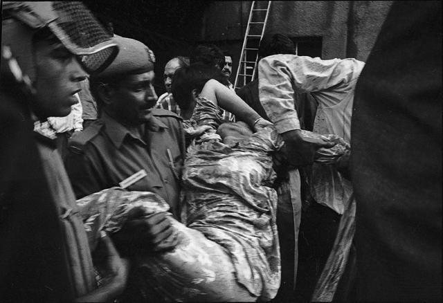 A policeman rescues an injured person from the Uphaar cinema. (Prakash Singh/HT File Photo) A policeman rescues an injured person from the Uphaar cinema. (Prakash Singh/HT File Photo)
