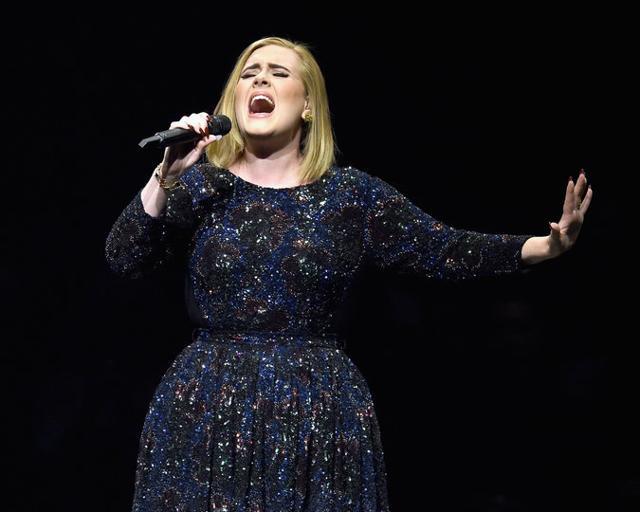 Adele, performing in Los Angeles in August, 2016. The fact that she and Beyoncé will face off in each of the top three categories — album, record and song of the year — gives the Grammys a rare tension that can only be good for ratings. (AP) Adele, performing in Los Angeles in August, 2016. The fact that she and Beyoncé will face off in each of the top three categories — album, record and song of the year — gives the Grammys a rare tension that can only be good for ratings. (AP)