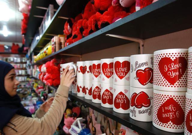 A young Lebanese woman shops for Valentine's day gifts at a store in the predominantly Shiite Muslim southern suburbs of the capital Beirut. AFP (AFP) A young Lebanese woman shops for Valentine's day gifts at a store in the predominantly Shiite Muslim southern suburbs of the capital Beirut. AFP (AFP)