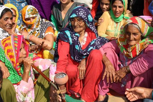Elderly women enjoying ‘hookah’ at Jassia village in Rohtak on Saturday. (Manoj Dhak/HT Photo)