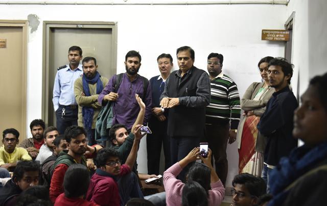 Milap Punia, director admissions, tries to pacify students. (Sushil Kumar/HT PHOTO) Milap Punia, director admissions, tries to pacify students. (Sushil Kumar/HT PHOTO)