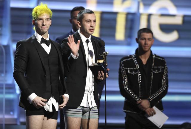 Josh Dun, left, and Tyler Joseph of Twenty One Pilots appear onstage without pants to accept the award. (Matt Sayles/Invision/AP) Josh Dun, left, and Tyler Joseph of Twenty One Pilots appear onstage without pants to accept the award. (Matt Sayles/Invision/AP)