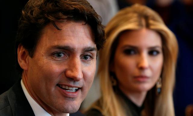Ivanka Trump looks toward Canadian Prime Minister Justin Trudeau (L) during US President Donald Trump's roundtable discussion on the advancement of women entrepreneurs and business leaders at the White House in Washington on February 13. (Reuters Photo)
