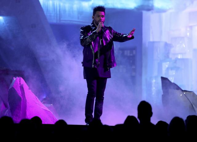 The Weeknd performs at the 59th annual Grammy Awards. (Matt Sayles/Invision/AP) The Weeknd performs at the 59th annual Grammy Awards. (Matt Sayles/Invision/AP)