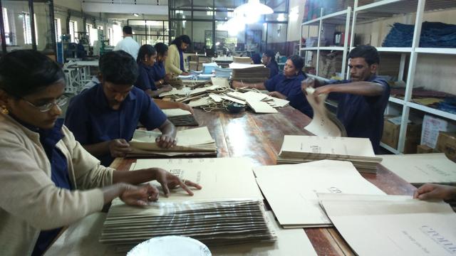 Employees at work in the paper-making unit. (Ayesha Banerjee)