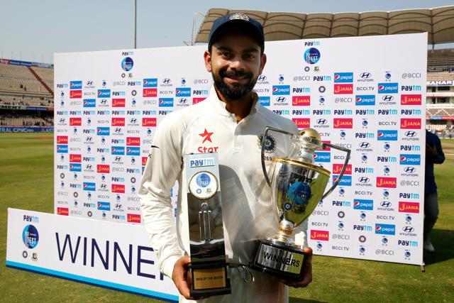 Virat Kohliwith Paytm Man of the Match and Winners Trophy during day five of the only test match against Bangladesh. (BCCI) Virat Kohliwith Paytm Man of the Match and Winners Trophy during day five of the only test match against Bangladesh. (BCCI)