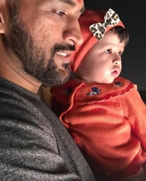 As her father, Mahendra Singh Dhoni offers prayers, little Ziva has her eyes set on something else she found interesting. (instagram.com/sakshisingh_r)