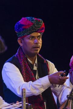 Bhungar Manganiyar plays khartal, a handheld instrument that creates music from wood and cymbals (Jodhpur RIFF ) Bhungar Manganiyar plays khartal, a handheld instrument that creates music from wood and cymbals (Jodhpur RIFF )