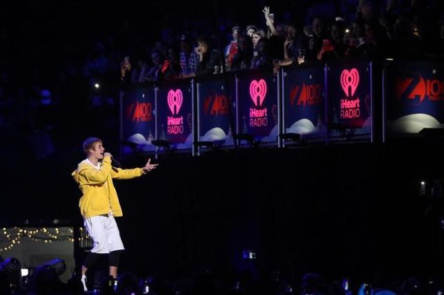 Justin Bieber performs at Z100's Jingle Ball in Manhattan, New York. Justin Bieber performs at Z100's Jingle Ball in Manhattan, New York.