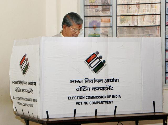 Uttarakhand CM Harish Rawat casted his vote at ITI Majara polling station in Dehradun. (PTI Photo) Uttarakhand CM Harish Rawat casted his vote at ITI Majara polling station in Dehradun. (PTI Photo)