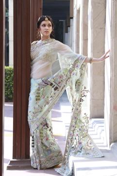 Mannara Chopra wore a Rahul Mishra sari teamed with an embellished blouse by Rimple &amp; Harpreet Narula. Borla: Vishal Jewels. Nose ring and kadas: Hazoorilal Legacy. Rings: Entice Jewellery. (Waseem Gashroo/HTPhoto)