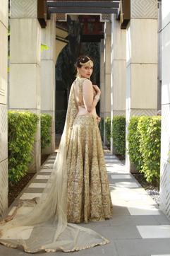Mannara Chopra wore a Rimple and Harpreet Narula ensemble teamed with a maatha patti and haath-phool by Hazoorilal Legacy, Earrings: Vishal Jewels, Kada: Mirari. (Waseem Gashroo/HT Photo)