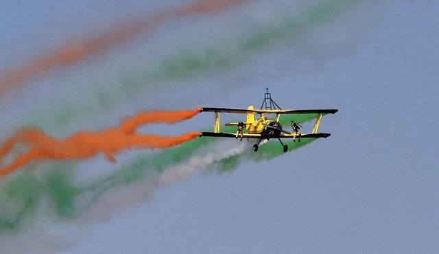Skycat Wingwalkers from the Scandinavian Airshow aerobatic team on the third day of the 11th biennial edition of Aero India 2017 at Yelahanka Air base in Bengaluru on Thursday. During flight two Skycats posed on the wings of the aircraft in different formations while the pilot made aerobatic manoeuvres such as loops and barrel rolls. (SHAILENDRA BHOJAK / PTI) Skycat Wingwalkers from the Scandinavian Airshow aerobatic team on the third day of the 11th biennial edition of Aero India 2017 at Yelahanka Air base in Bengaluru on Thursday. During flight two Skycats posed on the wings of the aircraft in different formations while the pilot made aerobatic manoeuvres such as loops and barrel rolls. (SHAILENDRA BHOJAK / PTI)