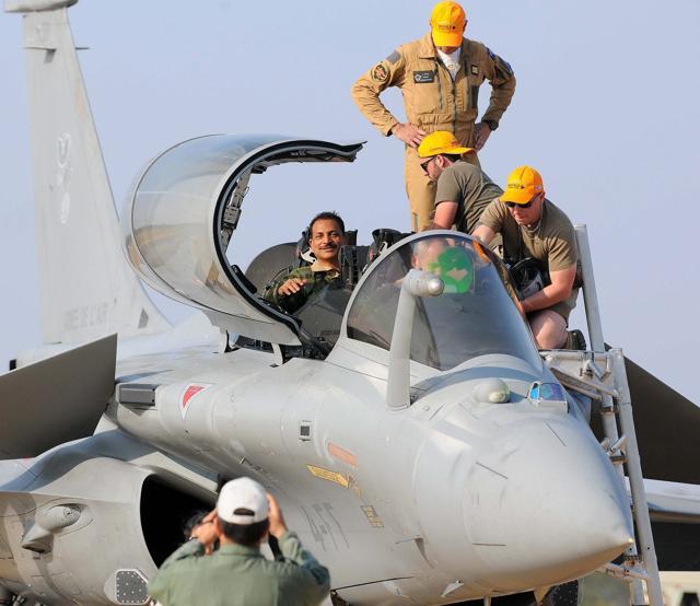 Union minister Rajiv Pratap Rudy on board a Rafake fighter during the second day of Aero India 2017 show at Yelahanka Air base in Bengaluru on Wednesday. The skill development minister, who holds a commercial pilot licence, flew for around 35 minutes, and said he reached 8G. India and France signed an inter-government agreement for purchase of 36 Rafale fighters off-shelf on September 23 this year. (PTI) Union minister Rajiv Pratap Rudy on board a Rafake fighter during the second day of Aero India 2017 show at Yelahanka Air base in Bengaluru on Wednesday. The skill development minister, who holds a commercial pilot licence, flew for around 35 minutes, and said he reached 8G. India and France signed an inter-government agreement for purchase of 36 Rafale fighters off-shelf on September 23 this year. (PTI)