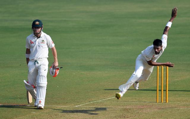 Australia's David Warner (L) looks on as India 'A' captain Hardik Pandya delivers a ball during the first day of three-day practice cricket match between India 'A' and Australia at The Brabourne Cricket Stadium. (AFP) Australia's David Warner (L) looks on as India 'A' captain Hardik Pandya delivers a ball during the first day of three-day practice cricket match between India 'A' and Australia at The Brabourne Cricket Stadium. (AFP)