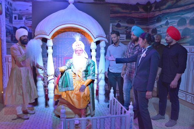 A guide briefing the visitors at the Punjab State War Memorial in Amritsar on Thursday. (Sameer Sehgal/HT Photo)