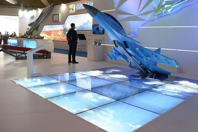 Visitors walk around scaled down models of aircraft at the Dassault on the third day of Aero India 2017. The five-day event has from Russia, Europe, Israel and the United States hardselling their latest armament technologies to India. (MANJUNATH KIRAN / AFP) Visitors walk around scaled down models of aircraft at the Dassault on the third day of Aero India 2017. The five-day event has from Russia, Europe, Israel and the United States hardselling their latest armament technologies to India. (MANJUNATH KIRAN / AFP)