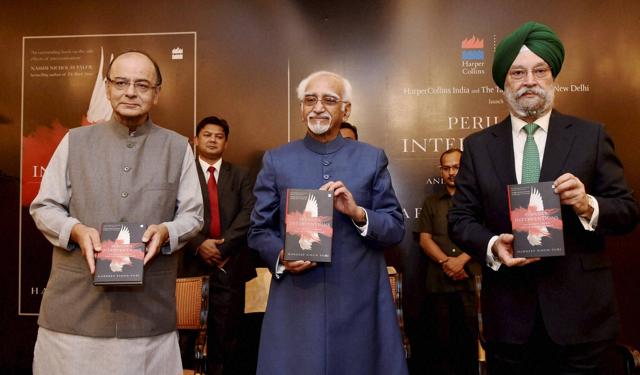Vice President Hamid Ansari with Finance Minister Arun Jaitley releasing Perilous Interventions by Hardeep Singh Puri (R) in New Delhi (ATUL YADAV/PTI) Vice President Hamid Ansari with Finance Minister Arun Jaitley releasing Perilous Interventions by Hardeep Singh Puri (R) in New Delhi (ATUL YADAV/PTI)