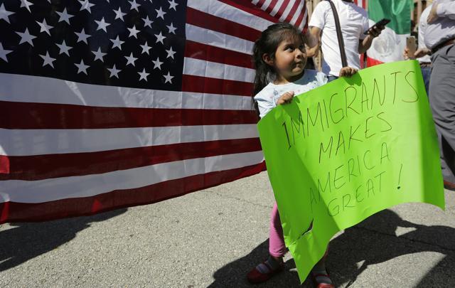 Yaretzi Perez, 4, holds a sign as she joins her family and others during a march and rally during an immigration protest, Thursday, Feb. 16, 2017, in Austin, Texas. (AP) Yaretzi Perez, 4, holds a sign as she joins her family and others during a march and rally during an immigration protest, Thursday, Feb. 16, 2017, in Austin, Texas. (AP)