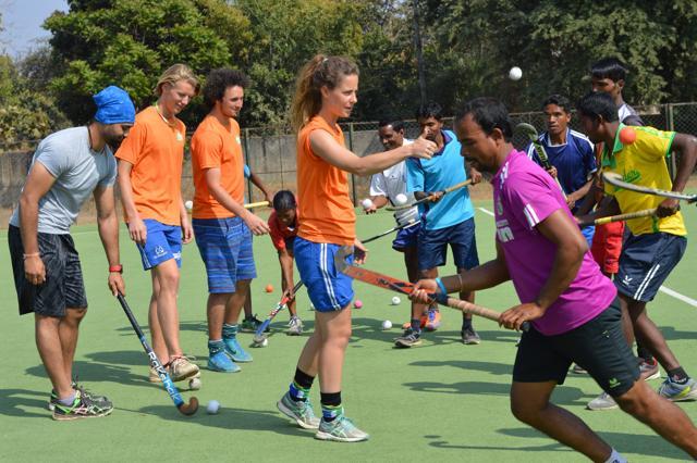Merel de Blaeij, an Olympic gold medallist with the Holland team in 2012, (in front), former India skipper Sandeep Singh, Wisse Kopal and Nicolaas den Ouden (from left) train coaches at Uchcha Bidyalaya (high school) stadium in Khunti, near Ranchi. Called Master Trainers, the Indian coaches teach students in 150 schools in Khunti district twice a week. The Dutch coaches were sent for this programme by Floris Jan Bovelander’s academy. (Tata Trusts)